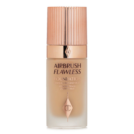 Charlotte Tilbury's Airbrush Flawless Foundation #5 Warm, 30ml, providing full coverage and a flawless matte finish, sweat-proof and hydrating.