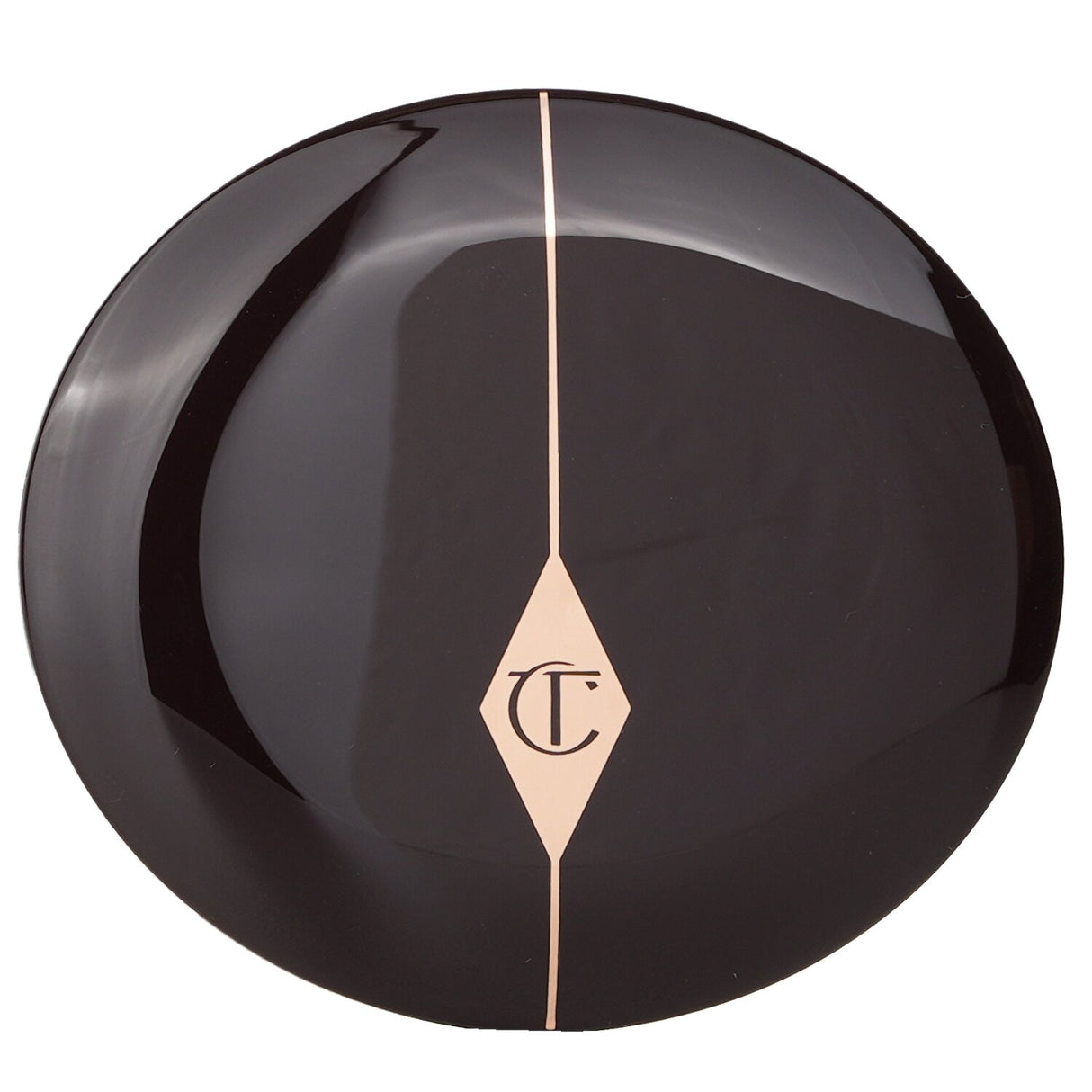 Charlotte Tilbury Cheek To Chic Blusher in #The Climax, offering creamy texture and buildable color for a radiant finish.