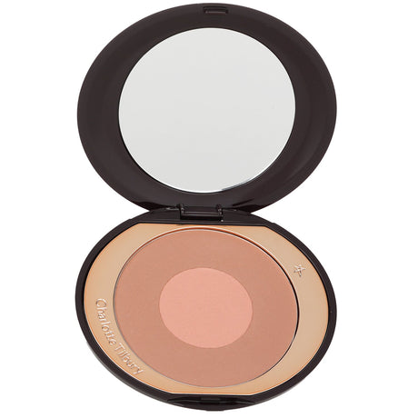 Charlotte Tilbury Cheek To Chic Blusher in #The Climax, featuring a creamy texture for a radiant, buildable glow.