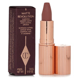 Matte Revolution lipstick in #VeryVictoria, a taupe nude shade, offers a hydrating matte finish for 10-hour wear.