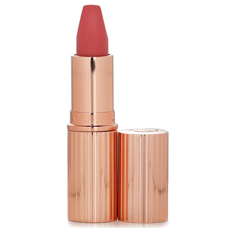 Golden coral Matte Revolution lipstick by Charlotte Tilbury, enriched with antioxidants for soft, long-lasting, hydrated lips.