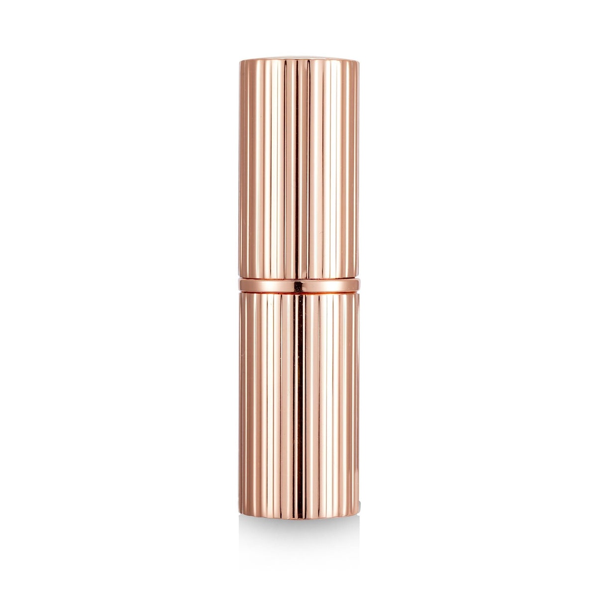 Charlotte Tilbury Matte Revolution lipstick in #Catwalking, a neutral nude peach for a modern matte finish and fuller lips.