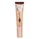 Charlotte's Beautiful Skin Foundation in #2 Warm, hydrating medium-coverage for a radiant and even-toned complexion.