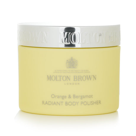 Molton Brown's Orange & Bergamot Radiant Body Polisher, a vegan scrub with orange peel and apricot kernels for smooth, radiant skin.