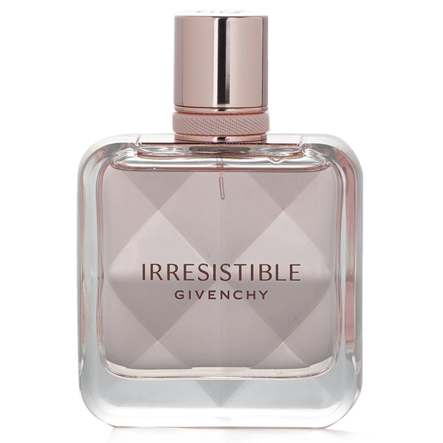 Givenchy Irresistible Eau De Toilette Spray, a floral-woody fragrance with notes of blackcurrant, rose, and cedar wood, 50ml.