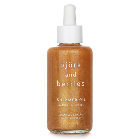 Luxurious Bjork & Berries Shimmer Oil in a 100ml bottle, enriched with birch extract for glowing, hydrated skin.