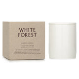Vegan scented candle in decorative container, featuring a woody aroma, hand-poured in Sweden, burns up to 55 hours.