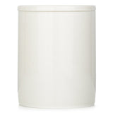 Vegan scented candle with fresh blueberry and smoky vetiver notes, burns for 55 hours in a decorative Swedish container.