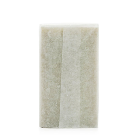 Vegan scrub soap bar with pumice and willow bark for double exfoliation, leaving skin soft and renewed.