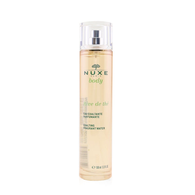 Nuxe Body Exalting Fragrant Water Spray in a 100ml bottle, featuring a refreshing blend of green tea, rhubarb, and herbs.