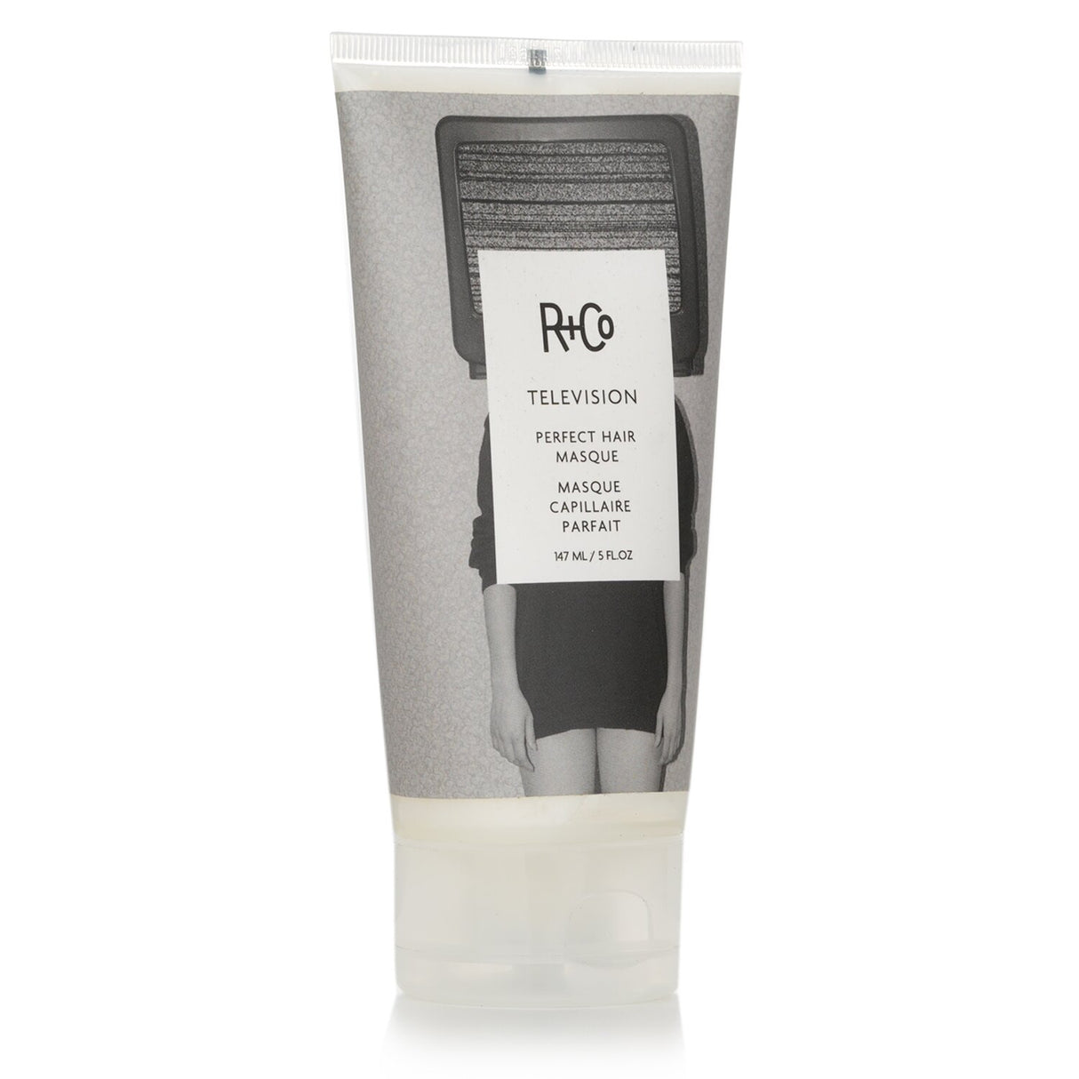 R+Co Television Perfect Hair Masque, a 147ml treatment with Snow Mushroom and Coconut Oil for hydrated, shiny, and manageable hair.