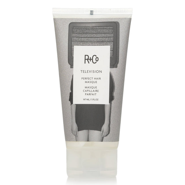 Luxurious R+Co Television Perfect Hair Masque with Snow Mushroom and Coconut Oil for hydration, shine, and frizz control.