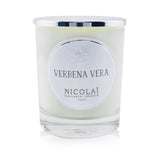 Nicolai Scented Candle in Verbena Vera, 190g, in a glass container, offering a soothing fragrance and 50 hours of burn time.