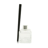 Contemporary glass cube diffuser filled with Aloe Vera Water, designed to enhance ambiance and release refreshing scent.