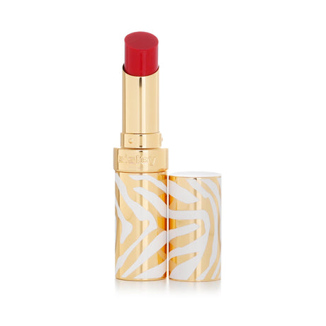 Luxurious Sisley Phyto Rouge Shine Lip Gloss in sheer red, offering lipstick color, gloss shine, and balm comfort in a chic case.