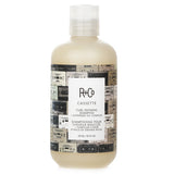 Curl-defining shampoo with Superseed Oil Complex, cleanses gently while moisturizing and enhancing natural curl shape.