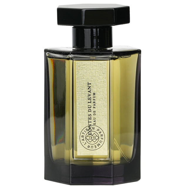 Elegant 100ml eau de parfum with floral woody notes; features damascene rose, patchouli, and spices for evening wear.