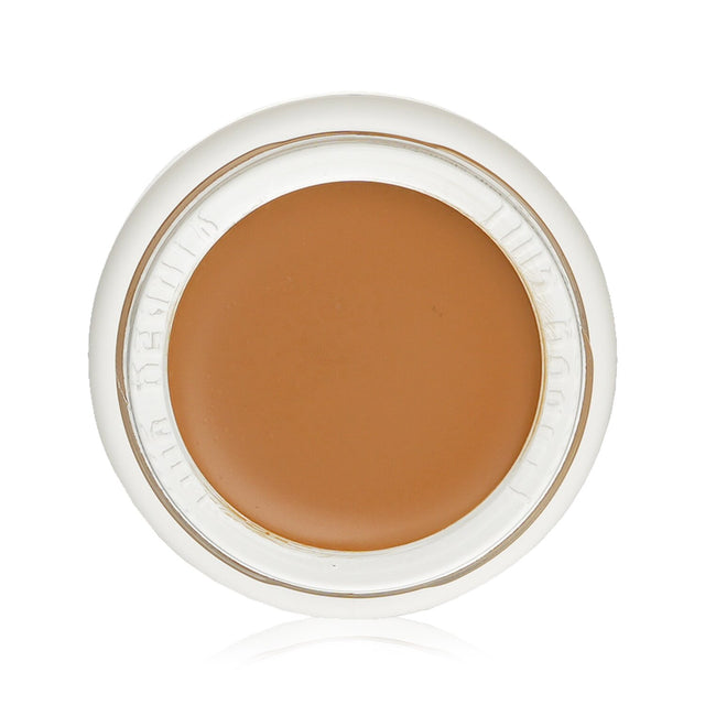 RMS Beauty 'Un' Cover Up #55, a lightweight concealer for flawless, natural skin with moisturizing and healing properties.