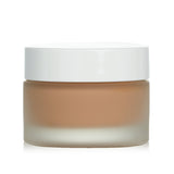 RMS Beauty "Un" Coverup Cream Foundation #33.5 offers hydrating, medium-to-full coverage for a radiant, dewy complexion.