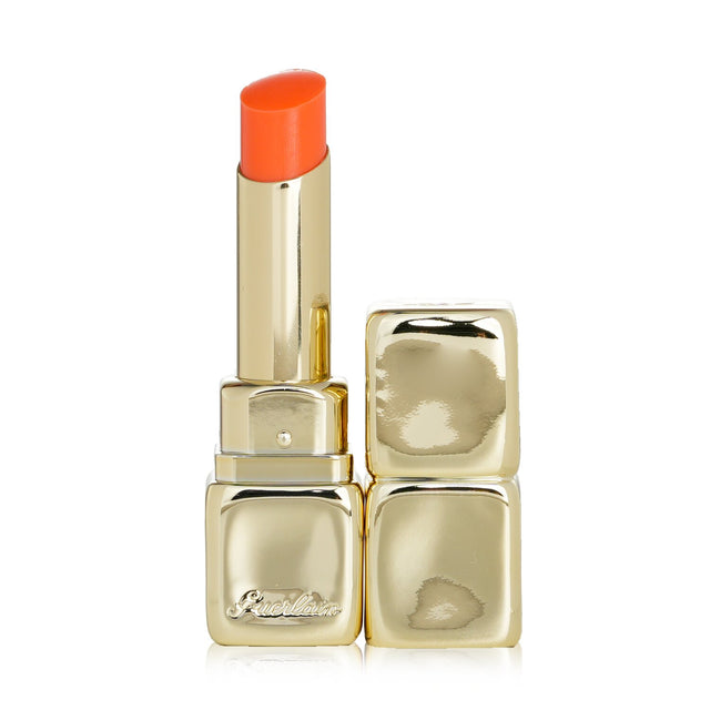 Guerlain KissKiss Bee Glow Lip Balm #319 Peach Glow, a nourishing tinted balm for hydrated, radiant lips with a creamy texture.