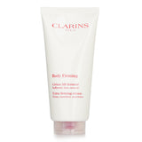 Luxurious Clarins Body Firming Extra-Firming Cream, 200ml, enriched with plant extracts for firm, elastic, hydrated skin.