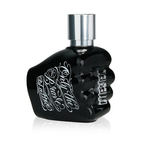 Diesel Only The Brave Tattoo Eau De Toilette Spray, a bold woody spicy fragrance for men with notes of apple, sage, and tobacco.