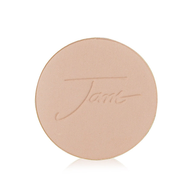 Mineral foundation refill in Suntan shade with SPF 20, offering water-resistant coverage for a flawless complexion.