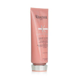 Kerastase Chroma Absolu Fondant Cica Chroma conditioner for color-treated hair, nourishing and strengthening for vibrant results.