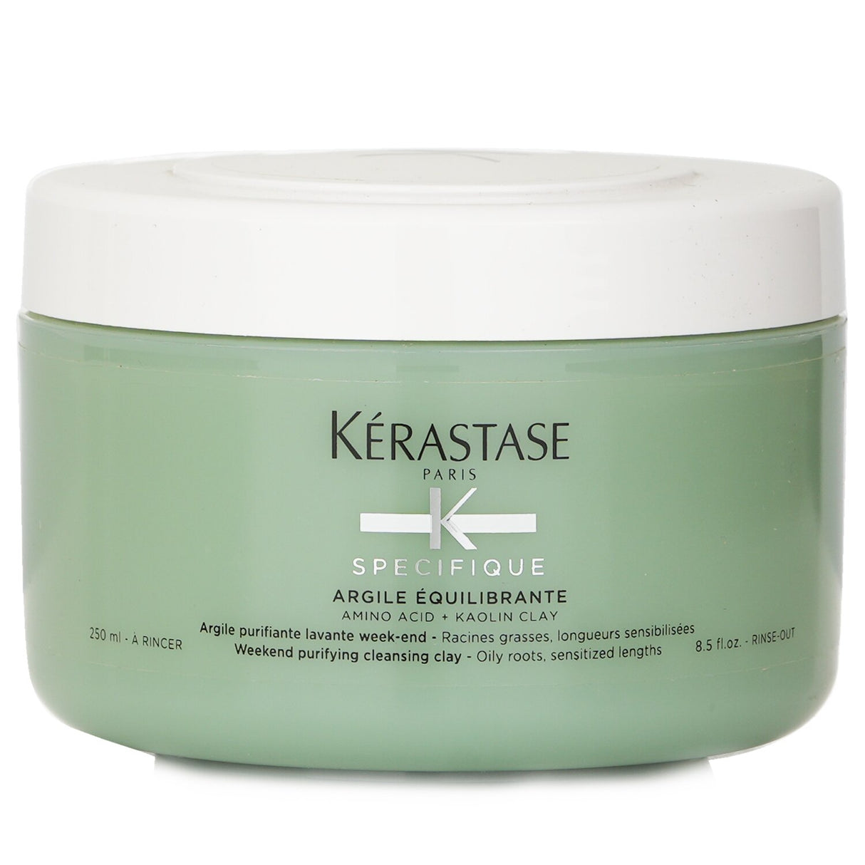 Kerastase cleansing clay in a sleek container, ideal for balancing oily roots and nourishing sensitive hair lengths.