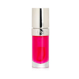 Delicate pink lip oil in a 7ml bottle, enriched with plant-based ingredients for hydrated and soft lips.