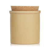Paddywax Dune Candle in ceramic jar, infused with orange zest and bergamot, clean-burning for 56 hours of uplifting ambiance.