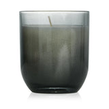 Ombre glass vessel candle labeled 'Investigator', burns cleanly for 42 hours with a soothing blend of fragrances.
