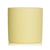 Colorful Paddywax Impressions Candle in Hang Loose scent, featuring a cotton wick and ceramic vessel, burns for 40 hours.