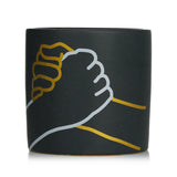 Scented Paddywax candle in colorful ceramic, featuring gold foil cover, burns 40 hours for cozy ambiance and gifting.