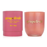 Petite grapefruit candle in glossy glass, eco-friendly soy blend, 35-hour burn, perfect for ambiance and gifting.