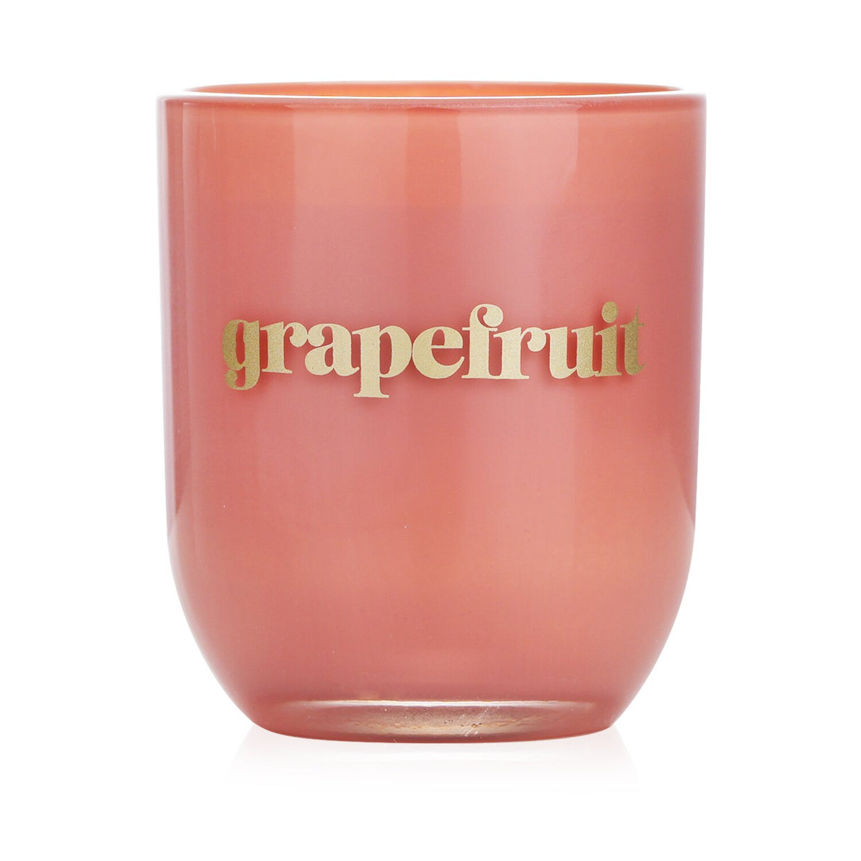 Petite soy wax candle in glossy glass, featuring vibrant grapefruit scent, burns cleanly for 35 hours, perfect for gifts.