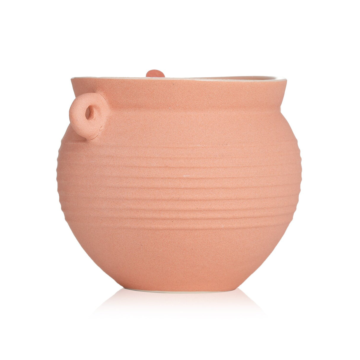Paddywax Santorini Candle in Raw Clay & Pear, housed in a pottery jug, offers a long-lasting, serene pear scent for your home.