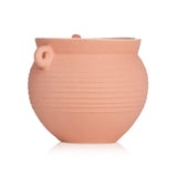 Paddywax Santorini Candle in Raw Clay & Pear, housed in a pottery jug, offers a long-lasting, serene pear scent for your home.