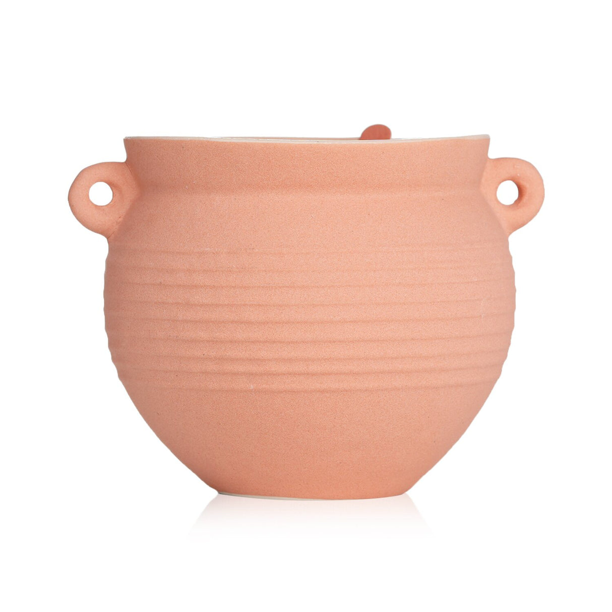 Hand-poured Paddywax Santorini Candle in Raw Clay & Pear, featuring a charming pottery jug, offers 60 hours of inviting fragrance.