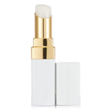 Hydrating tinted lip balm in #912 Dreamy White, offering buildable color and 12-hour comfort with luxurious packaging.