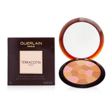 Guerlain Terracotta Light bronzer in #02 Medium Cool, offering a sun-kissed glow with nourishing natural ingredients.