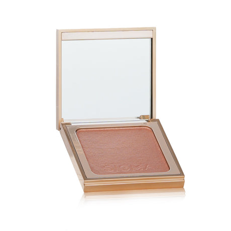 Sigma Beauty Highlighter in Sunstone, a vegan, pressed powder for a radiant glow in a sleek compact.