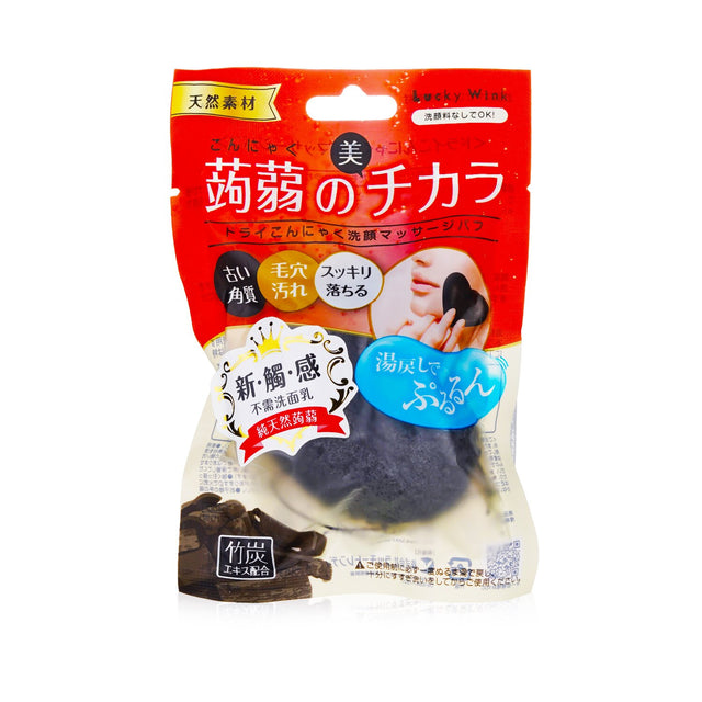 Konjac face wash puff with bamboo charcoal for gentle exfoliation and moisturizing, promoting fresh and radiant skin.