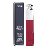 Dior Addict Lip Tint in Natural Berry: luxurious, hydrating, long-lasting color with precise applicator and signature logo.