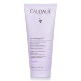 Luxurious Caudalie body lotion in a 200ml bottle, deeply hydrates with 98% natural ingredients for soft, radiant skin.