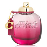 Floral fruity Coach Wild Rose Eau De Parfum in a glass bottle, featuring notes of red currant, rose, and jasmine.