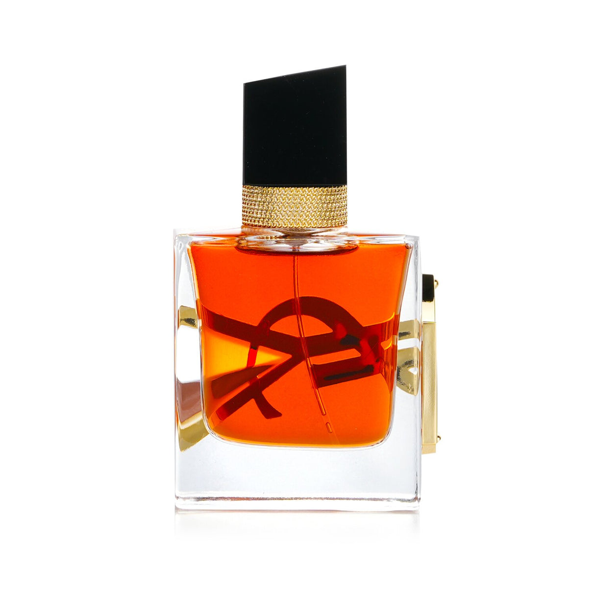 Yves Saint Laurent Libre Le Parfum in a luxurious gold bottle, featuring an intense floral scent with spicy undertones.