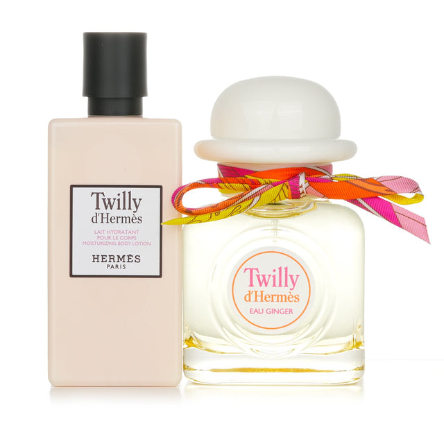 Luxurious Hermes Twilly D'Hermes Eau Ginger Set featuring 85ml Eau De Parfum and 80ml Moisturizing Body Lotion.