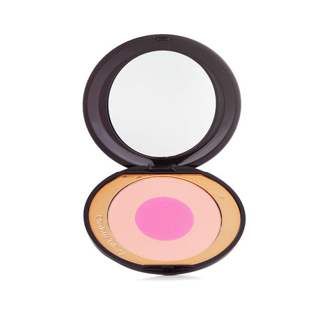 Charlotte Tilbury Cheek To Chic Blusher in #Love Is The Drug, 8g, offers a creamy texture and buildable formula for a radiant glow.