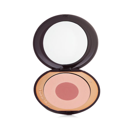 Charlotte Tilbury Cheek To Chic Blusher in #Sex On Fire, featuring a creamy texture and buildable formula for a radiant glow.